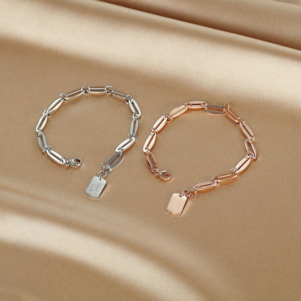 Women's Stainless Steel Bracelet with Good Luck Engraved Pendant Women's Stainless Steel Bracelet with Good Luck Engraved Pendant
